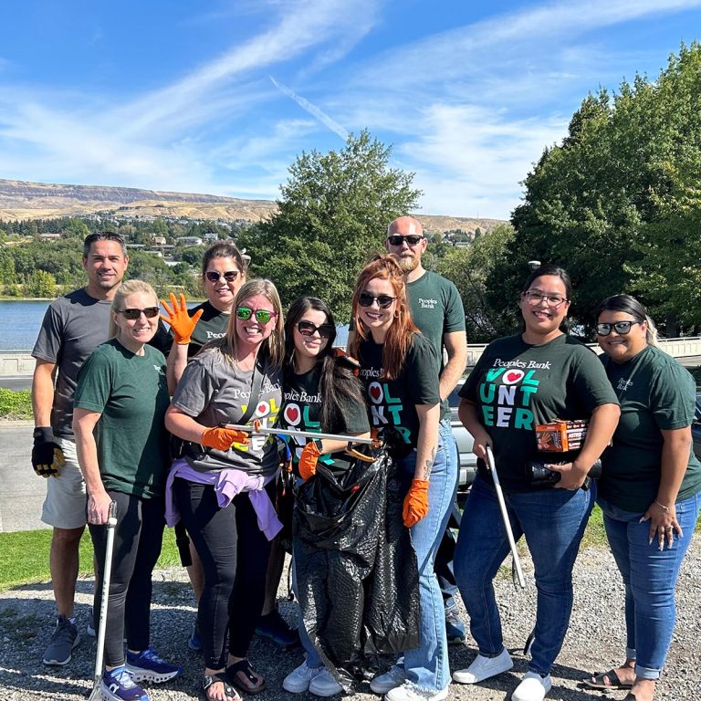 Peoples Bank employees volunteering for Clean Up day in Chelan, 2024